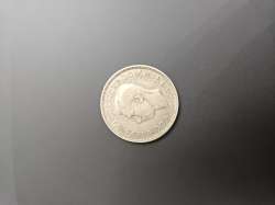 1941 British Two Shillings coin. Authentic wartime piece featuring King George V