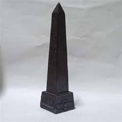 Egyptian obelisk with hieroglyphs—pharaonic decor in antique collectible style