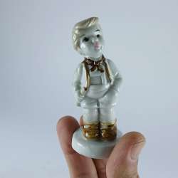 Vintage Porcelain Boy Figurine Hand-Painted Milk White Ceramic Unmarked Hummel