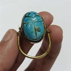 Ancient Egyptian scarab ring, antique archaeological style, engraved hieroglyphs