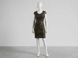 This is a form-fitting, cap-sleeve dress featuring a sophisticated black and gol