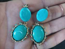 Women s gold colored earrings studded with precious stones turquoise and are c