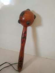 An ancient antique handmade of wood in the form of a tool used in war called a p