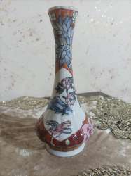 A masterpiece in the form of a hand-decorated colorful porcelain vase Made in Ma