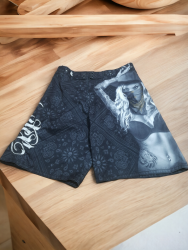 Swimming shorts with a swimming girl design