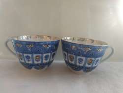 vintage antique handmade porcelain cup, engraved with gold water, and labeled 17