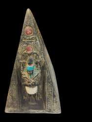 The basalt statue of the pyramid of Osiris and the god Horus is an ancient good