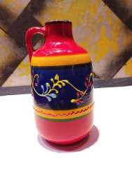 Antique pottery jug made of hand painted ceramic