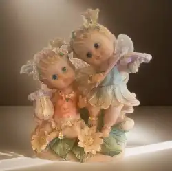 Children playing to perfection little princesses figurine made of resin