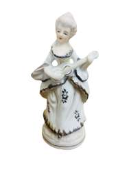 Antiqu Porcelain figurine of a beautiful woman playing an  sealed musical