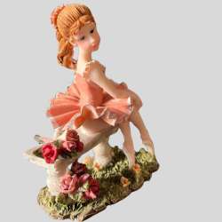 Beautiful Rare Find Ballerina White Tutuon Stone Bench Holding Bundle Of Flowers
