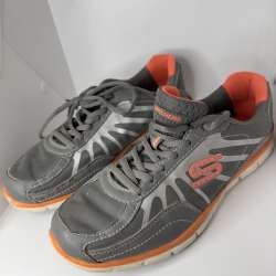 Woman's Used Grey & Orange Air Cooled Skechers US size 7.5