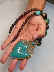 Vintage brass metal necklace with green stone made of brass and faux wood beads