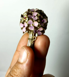 An antique bouquet of roses, a decorative necklace for women, made of copper