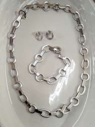 A unique  accessory set made of iron consisting of a necklace earrings  bracelet
