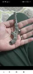 Antique children's toys made from antique iron cartridges