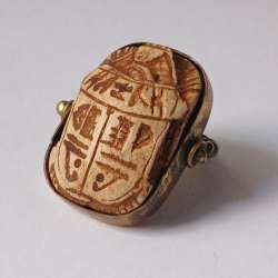 Handcrafted Egyptian scarab ring with ancient-style hieroglyphic carvings.
