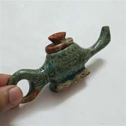 Hammer stone oil lamp in ancient Egyptian style with carved hieroglyphic symbol