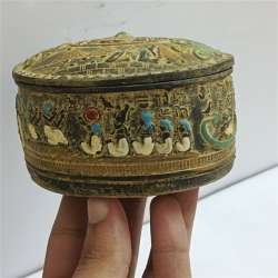 Egyptian oval box handcrafted with pharaonic hieroglyphic decorations, a keepsak