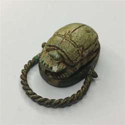 Ancient Egyptian scarab with a copper ring, antique pharaonic style jewelry piec
