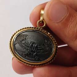Vintage brass pendant with engraved eagle design, unique handmade jewelry