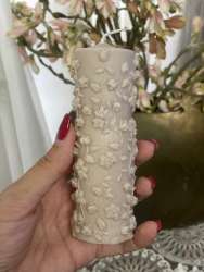 Elegant handmadecandle with detailed floral pattern ideal for stylish home décor