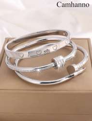 A set of 3 elegant silver-tone bracelets, embellished with sparkling rhinestones