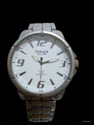 OMAX watch men  used .Classic Vintage Designer Stainless Steel Rhodium