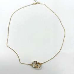 14K yellow gold necklace with two interlocked rings symbolizing eternal love