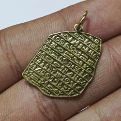Copper Rosetta Stone pendant engraved with ancient Egyptian hieroglyphs