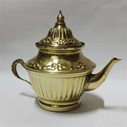Vintage brass teapot with ornate detailing classic antique décor collectible