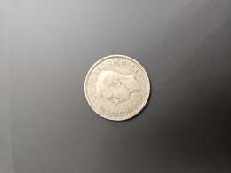 1941 British Two Shillings coin. Authentic wartime piece featuring King George V