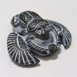 Carved Egyptian scarab stone—rare vintage piece in ancient archaeological style