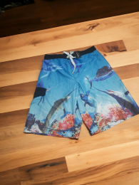 Swim shorts with cinematic designs