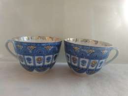 vintage antique handmade porcelain cup, engraved with gold water, and labeled 17