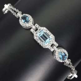 gorgeous bracelet 925 silver Sky blue topaz 5.55 grams COATING White gold 14k