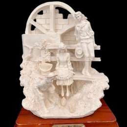 A valuable masterpiece of porcelain and gypsum. Two men and a woman on the river