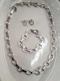 A unique  accessory set made of iron consisting of a necklace earrings  bracelet