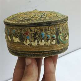Egyptian oval box handcrafted with pharaonic hieroglyphic decorations, a keepsak