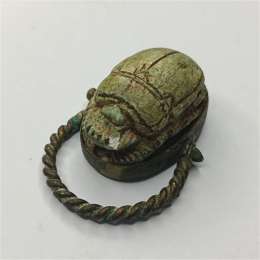Ancient Egyptian scarab with a copper ring, antique pharaonic style jewelry piec