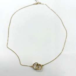 14K yellow gold necklace with two interlocked rings symbolizing eternal love