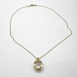 14K yellow gold necklace with elegant oval pendant and sparkling center stone