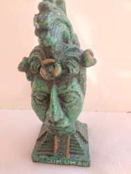 vintage antique statue embodying Egyptian civilization, hand-carved from adhesiv