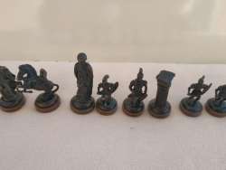 vintage antiqueChess pieces in the form of bronze statues, hand-carved in blacke