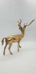 Decorative Figurine Of A Deer, Cast In Bronze , Serves As An Elegant Decoration.